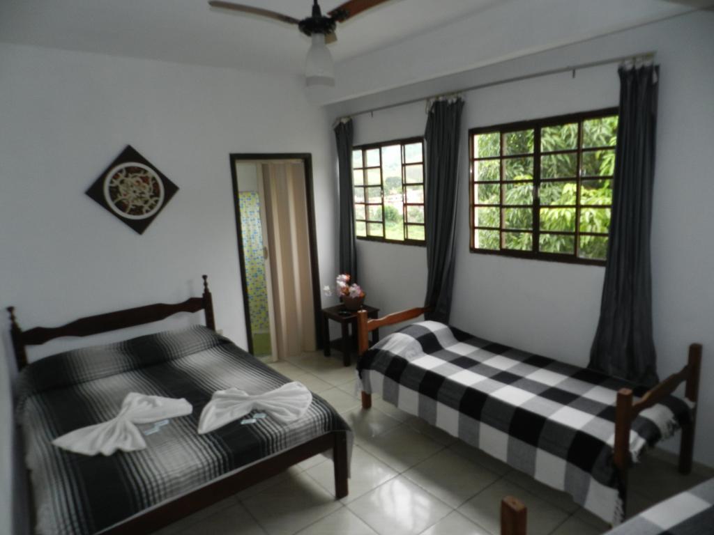 Pousada Hospedaria Santa Clara Santa Rita de Jacutinga Kamer foto