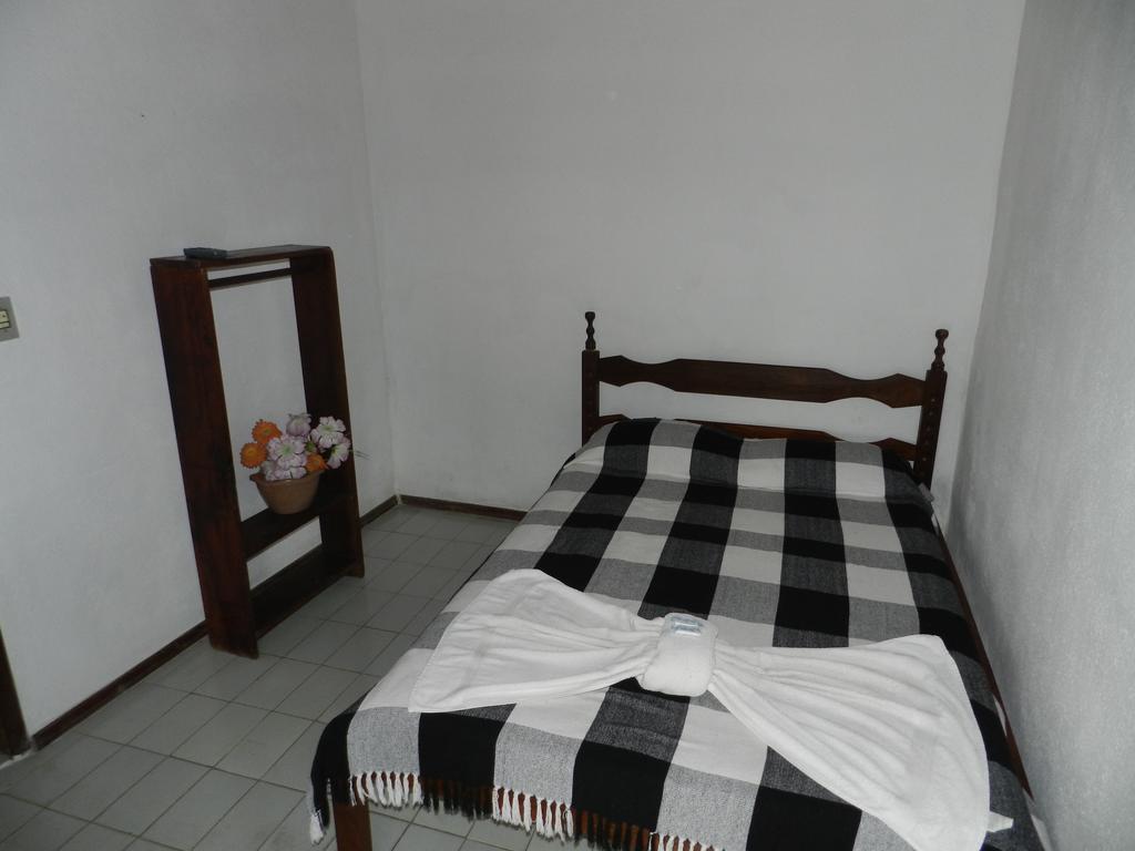 Pousada Hospedaria Santa Clara Santa Rita de Jacutinga Kamer foto